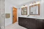 This stunning bathroom features a modern design with a touch of rustic charm.