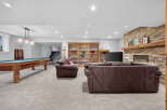 This stunning property boasts a spacious game room, perfect for entertaining and relaxation.