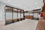This stunning mudroom offers a blend of functionality and style, perfect for organizing your belongings.