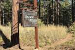 Discover the charm of Edgemont Highlands! This picturesque sign welcomes you to a community surrounded by lush forests and scenic trails.