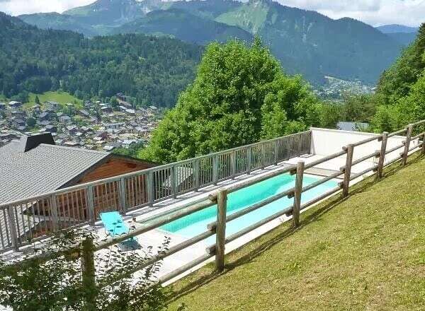 Experience breathtaking mountain views from this stunning property featuring a private pool.