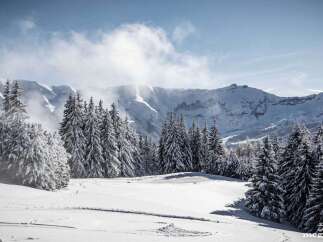 Experience the serenity of winter in this stunning mountain property.