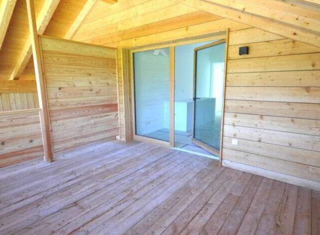Discover the charm of this stunning wooden interior, perfect for a cozy retreat.