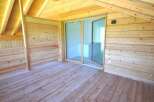 Discover the charm of this stunning wooden interior, perfect for a cozy retreat.