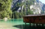 Nestled on the serene shores of a pristine lake, this charming wooden cabin offers a unique blend of rustic charm and natural beauty.
