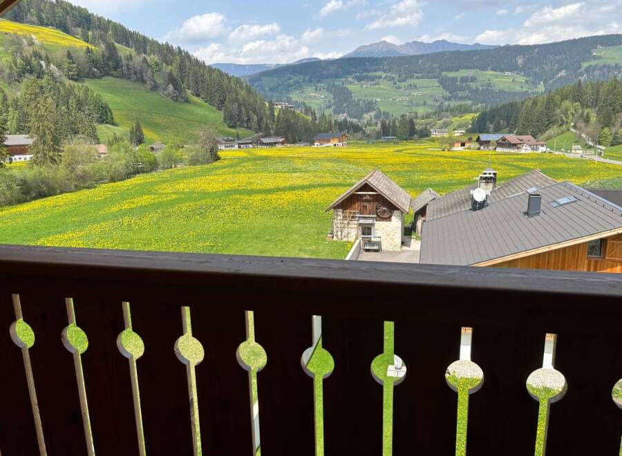 Experience breathtaking views from this charming property nestled in a picturesque valley.