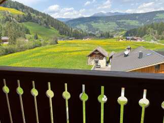 Experience breathtaking views from this charming property nestled in a picturesque valley.