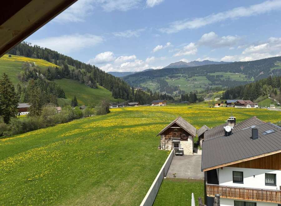 Discover your dream home nestled in a picturesque landscape.