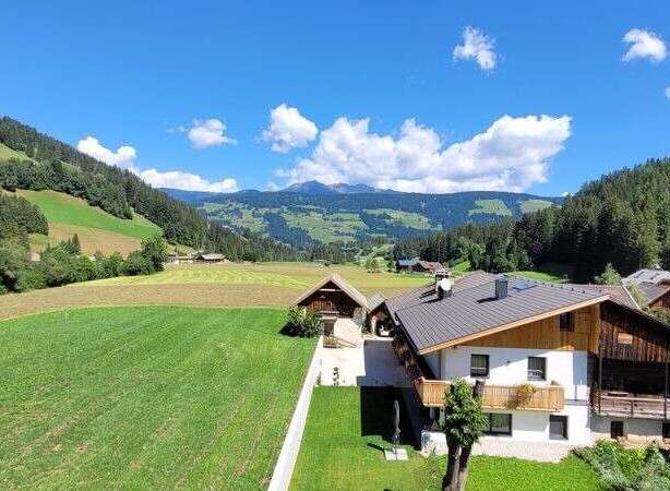 Discover your dream home nestled in a picturesque mountain landscape.