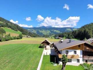 Discover your dream home nestled in a picturesque mountain landscape.