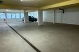 Discover this spacious and well-lit parking garage, perfect for secure vehicle storage.