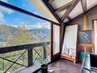 Experience breathtaking mountain views from this stunning property.