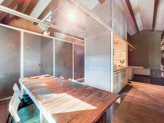Discover modern living in this stunning property featuring a unique industrial design.