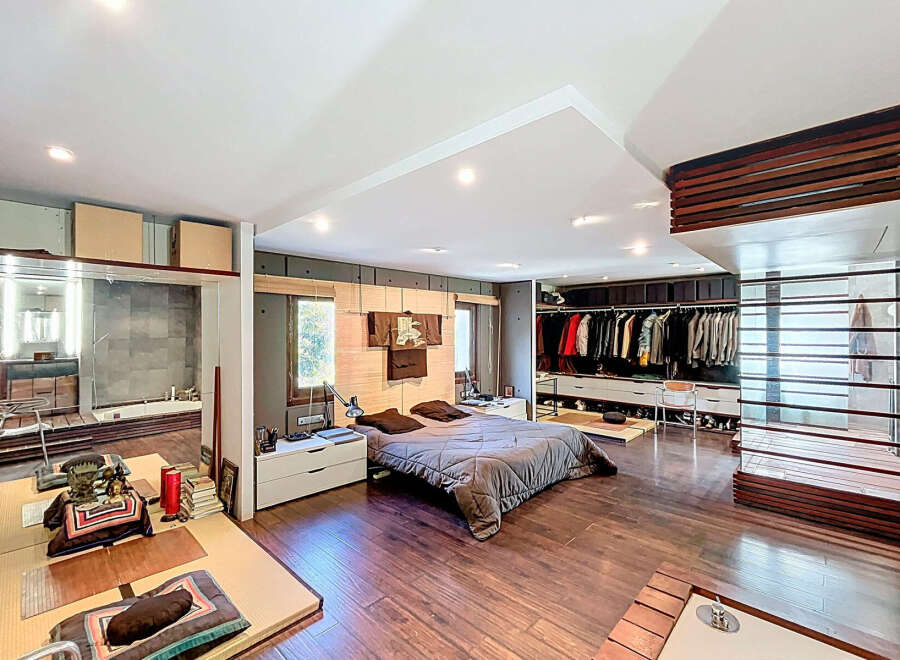 Step into luxury with this stunning bedroom featuring a spacious layout and modern design.