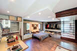 Step into luxury with this stunning bedroom featuring a spacious layout and modern design.