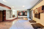 Step into luxury with this stunning bedroom featuring a spa-like bathroom and a spacious walk-in closet.