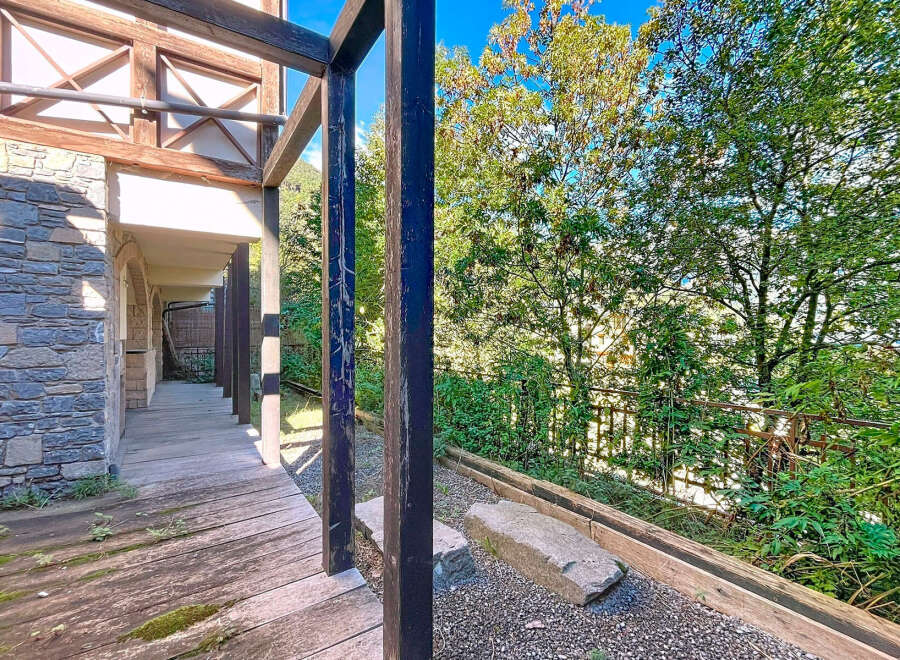 Discover the charm of this stunning property, featuring a beautifully designed wooden deck that seamlessly blends indoor and outdoor living.