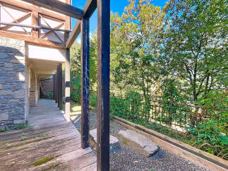 Discover the charm of this stunning property, featuring a beautifully designed wooden deck that seamlessly blends indoor and outdoor living.