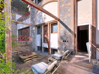 Discover a unique property with stunning architectural details.