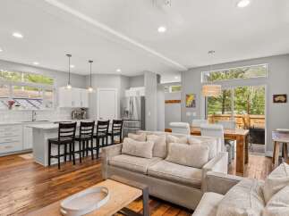 Step into luxury with this stunning open-concept living space! Featuring a gourmet kitchen with a breakfast bar, perfect for entertaining.