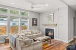 Step into luxury with this stunning living room, boasting a cozy fireplace and elegant design.