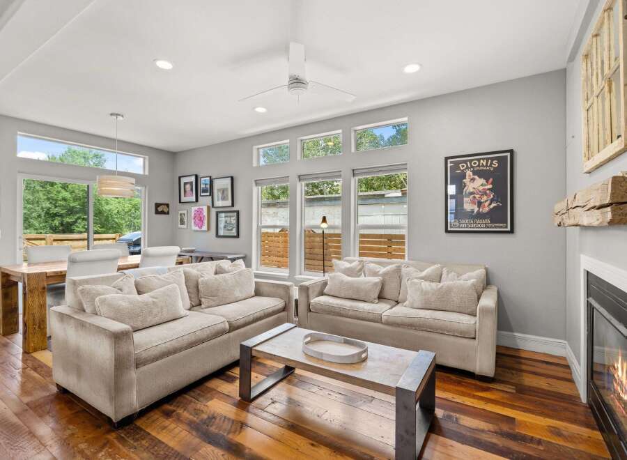 This stunning living room boasts a modern design with a cozy atmosphere.