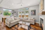 This stunning living room boasts a modern design with a cozy atmosphere.