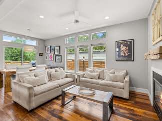 This stunning living room boasts a modern design with a cozy atmosphere.