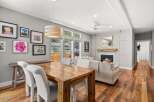 Step into this stunning home featuring a cozy fireplace, perfect for those chilly evenings.