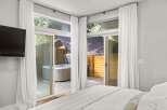 Enjoy luxury living with this stunning property featuring a private hot tub and a serene outdoor space.
