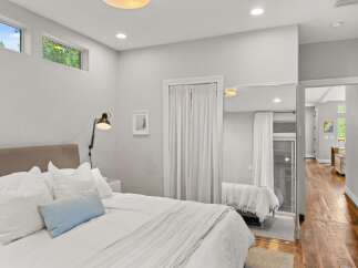 This stunning bedroom boasts a modern design with clean lines and ample natural light.