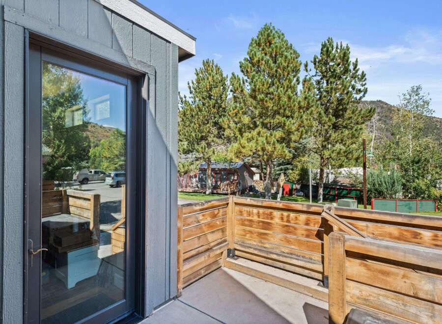 Enjoy the serene views from this charming property, featuring a private deck and a modern design.