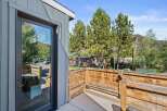 Enjoy the serene views from this charming property, featuring a private deck and a modern design.