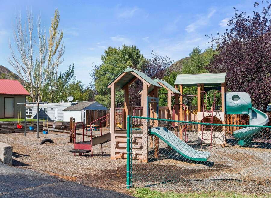 This property boasts a fantastic playground, perfect for families with children.