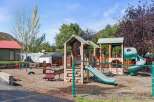 This property boasts a fantastic playground, perfect for families with children.