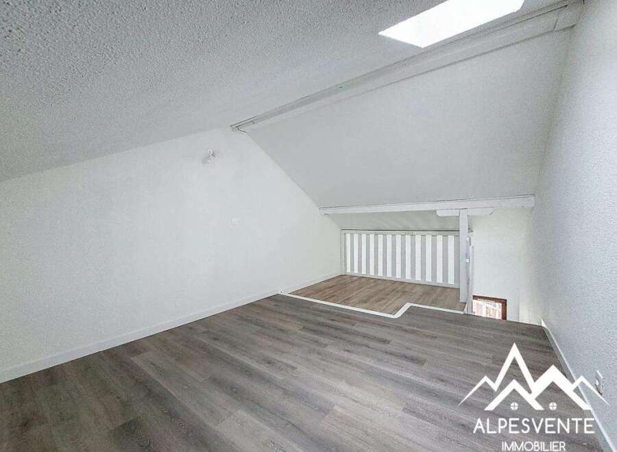Discover this charming property featuring a unique loft space, perfect for a home office or cozy retreat.