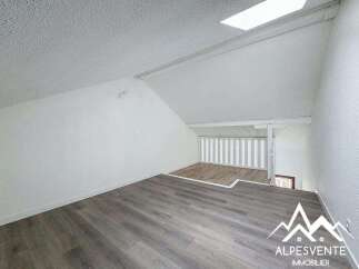 Discover this charming property featuring a unique loft space, perfect for a home office or cozy retreat.