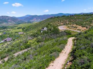 Discover the epitome of luxury living with this stunning property nestled in a picturesque mountain landscape.