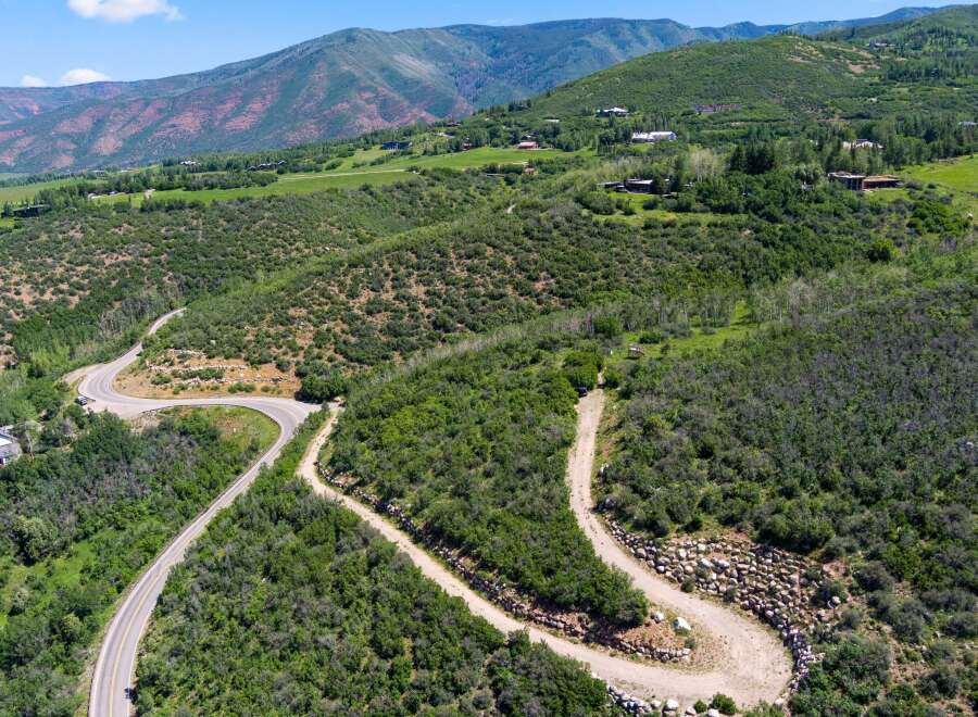 Discover the serenity of this stunning mountain property, offering unparalleled views and privacy.