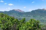 Nestled amidst the majestic mountains, this property offers breathtaking views and a serene escape.