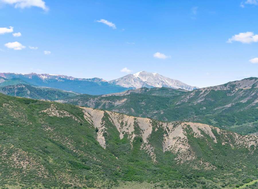 Explore the breathtaking mountain views from this stunning property.