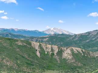 Explore the breathtaking mountain views from this stunning property.