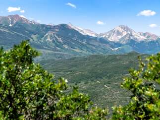 Experience breathtaking mountain views from this stunning property.