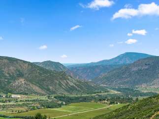 Nestled amidst the majestic mountains, this property offers breathtaking views and a serene escape.