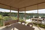 Experience luxury living with this stunning property featuring panoramic mountain views.