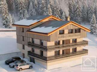 Discover the charm of this stunning alpine property, nestled amidst a picturesque winter wonderland.