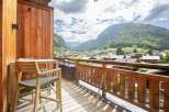 Enjoy breathtaking mountain views from this stunning balcony.