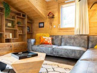 This cozy living space features a stylish gray sectional sofa, perfect for relaxing.