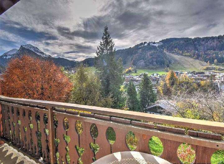 Enjoy breathtaking mountain views from this charming property.