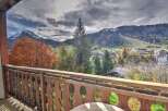 Enjoy breathtaking mountain views from this charming property.